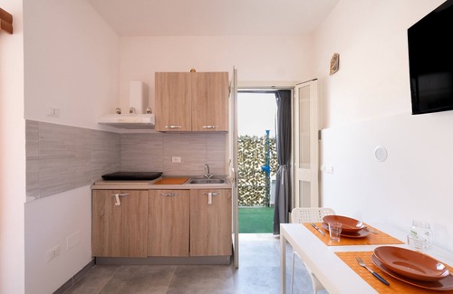 Sant'Isidoro Apartment | Apartment 'Oasi Del Conte Tre' with Private Terrace and Air Conditioning