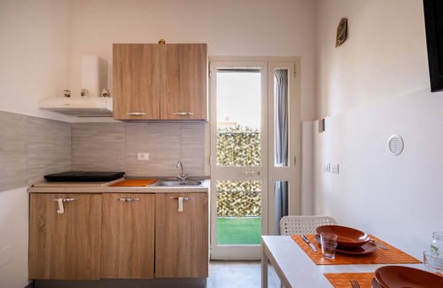 Sant'Isidoro Apartment | Apartment 'Oasi Del Conte Tre' with Private Terrace and Air Conditioning