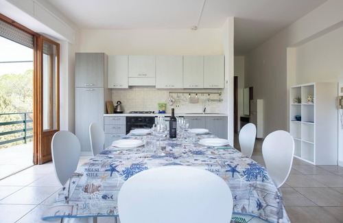 Cala Gonone Apartment | Apartment 'Oriente' with Private Terrace, Wi-Fi and Air Conditioning