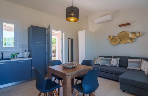 Aglientu Apartment | Apartment 'Sughereto 2, Vigna E Vista' with Sea View, Wi-Fi and Air Conditioning