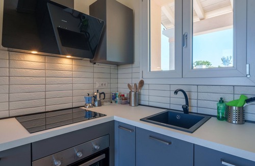 Aglientu Apartment | Apartment 'Sughereto 2, Vigna E Vista' with Sea View, Wi-Fi and Air Conditioning