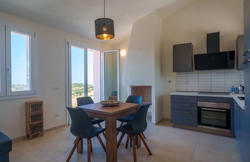 Aglientu Apartment | Apartment 'Sughereto 2, Vigna E Vista' with Sea View, Wi-Fi and Air Conditioning