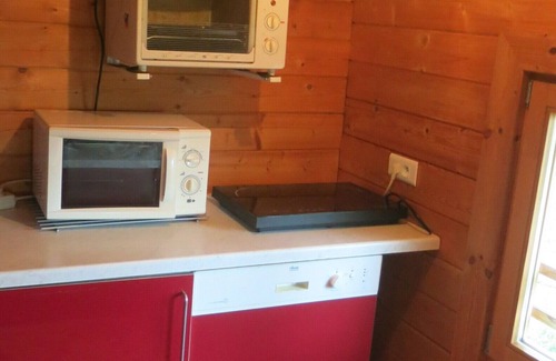 Olmiccia Apartment | Apartment with balcony and pool in a superb stone and wood chalet