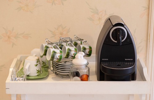 Capivari Apartment | Apartment with fireplace in Campos do Jordão