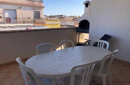 Tre Fontane Apartment | Apartment with covered terrace and barbecue near sea and center