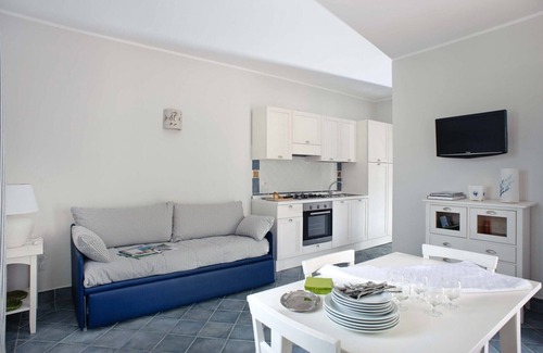 Villammare Apartment | Apartment with terrace. Shared pool. 150 metres from beach