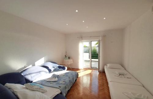 Brela Apartment | Apartments with parking space Brela, Makarska - 18417