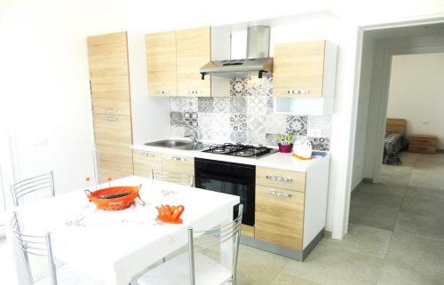 Torre San Giovanni House | Appartamento Torre San Giovanni Beethoven 27 - Verso Sud