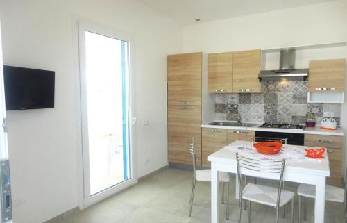 Torre San Giovanni House | Appartamento Torre San Giovanni Beethoven 27 - Verso Sud