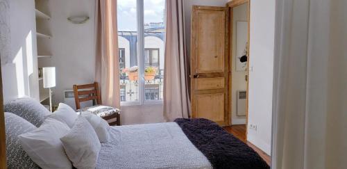 Quartier Saint-Ambroise Apartment | Appartement avec balcon au cœur PARIS