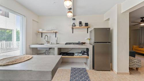 Rincon House | Apt 413- Walk to the beach, plaza and restaurants