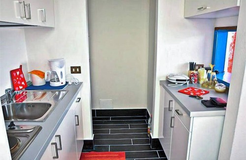 Susello Apartment | Attractive studio with terrace and garden, pool and dream view