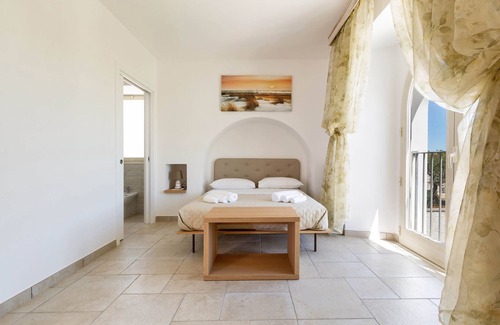 Pittuini House | B&B I Tarocchi - Suite La Forza