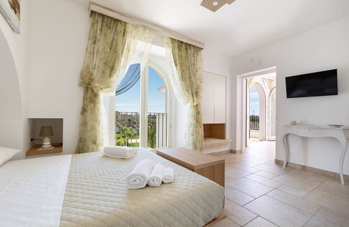 Pittuini House | B&B I Tarocchi - Suite La Forza