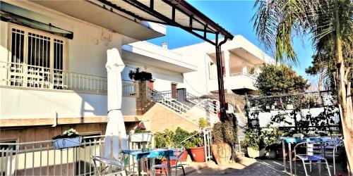 Scala di Furno Apartment | Baia del Conte Apartments Porto Cesareo - Appartamenti in villa sul mare Tabu-Dune