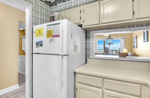 Caswell Beach Condo | Balcony At The Beach: Oceanfront Condo with Community Pool