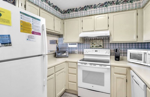 Caswell Beach Condo | Balcony At The Beach: Oceanfront Condo with Community Pool