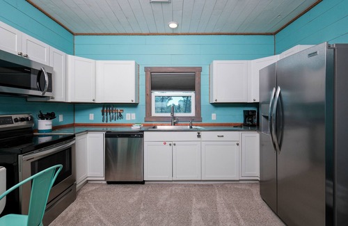 Fort Morgan Cottage | Bayfront Vacation! Enjoy amazing sunsets, wildlife viewing, and fishing.