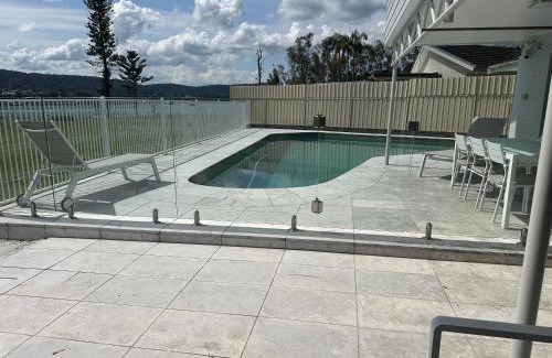 Green Point House | Bayview Luxury Waterfront Escape with Pool & Spa