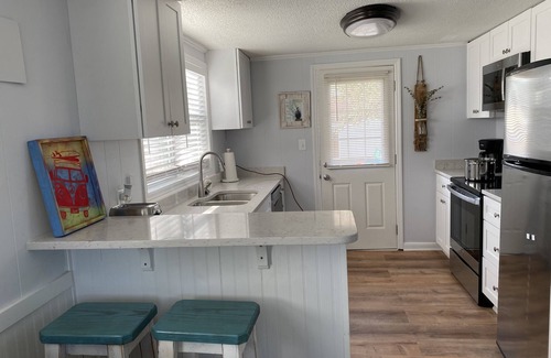 Wilmington Beach House | Beach bungalow at pistachio: one block from the beach and Tiki bar