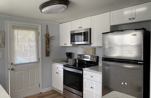 Wilmington Beach House | Beach bungalow at pistachio: one block from the beach and Tiki bar