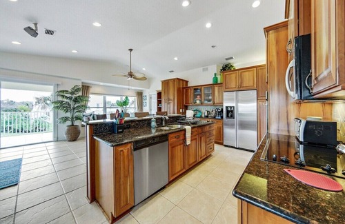 Marineland Acres House | Beach Home with Amazing Oasis Pool, Spa, Waterfall, Fire Pit, Bikes