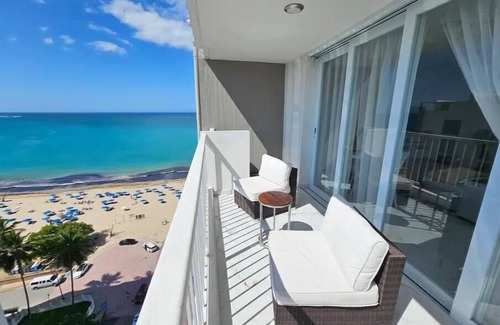Isla Verde Apartment | Beachfront 2 bedroom apt in Isla Verde. 2-5 minute walk to restaurants & shops!