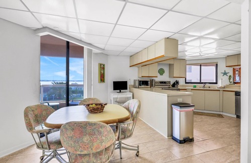 Sand Key Condo | Beachfront condo with multiple balconies, heated pool, gym, hot tub & AC