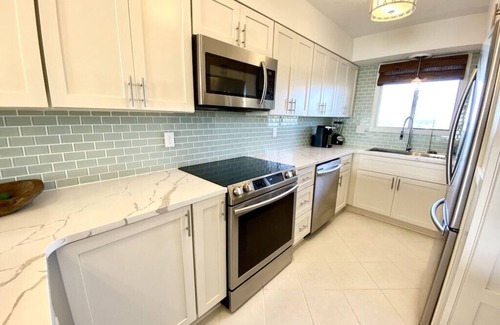 Crescent Beach Condo | Beachfront Dream! Free Beach Service & Completely Remodeled! Pool & Tiki Bar