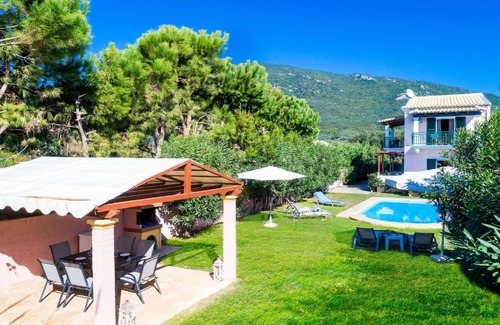 Agios Matthaios Villa | Beachfront Villa Rania by PosarelliVillas