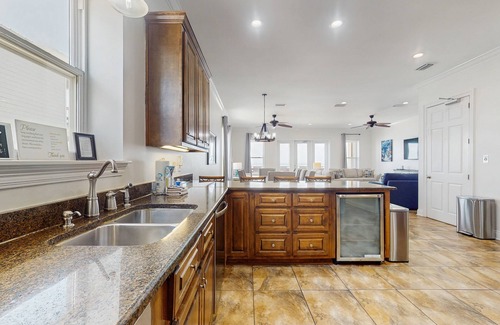 Fort Morgan House | Beachfront wedding/event venue duplex with private pools, elevators, and suites
