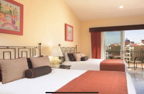 Flamingos Hotel | Beautiful 2 bedroom villa suite in Puerto Villarta Mexico. Premium seasonality