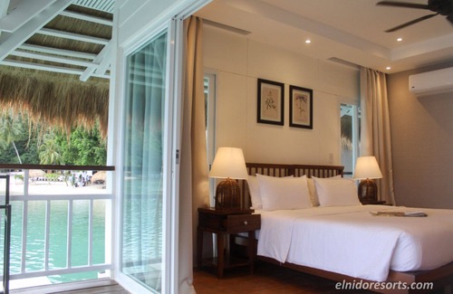 Taytay Cottage | Beautiful 5 Star Loft Water Cottage with Sea Views on Apulit Island Resort, El Nido Cottage 1002