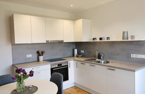Fischbach Condo | Beautiful apartment with balcony just a few minutes' walk from the lake