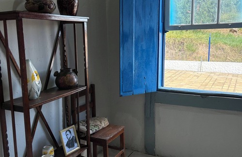 Tres Coracoes Cottage | Beautiful Centennial Farm in Três Corações