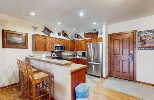 Peak 9 Condo | Beautiful condo in the heart of town with hot tubs & pool - walk to lifts