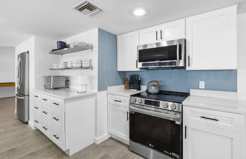 Baywood Village House | Beautiful Oceanfront 4BR Palm Harbor home w/pool, chef's kitchen, and boat dock