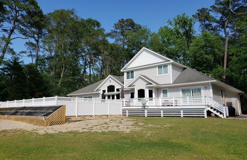 Kitty Hawk House | Beautiful Secluded Canalfront Home. Access to Private Beaches and Marina