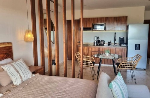 Puerto Morelos Apartment | Beautiful Studio with Rooftop Pool Sea view
