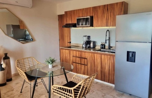 Puerto Morelos Apartment | Beautiful Studio with Rooftop Pool Sea view