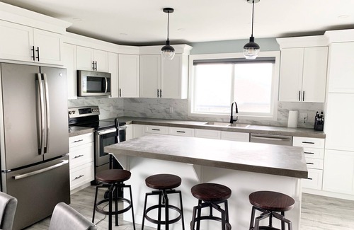 Okanagan-Similkameen House | Beautiful suite in great neighbourhood, modern finishes and steps to KVR trail.