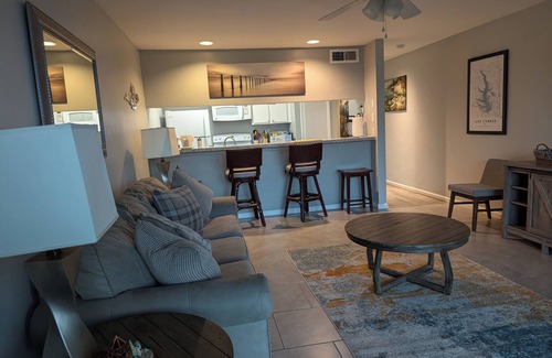 Walden on Lake Conroe Apartment | Beautiful sunrises waterfront condo with boat docking on backyard