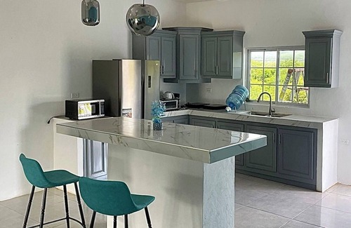 Spur Tree House | Beautiful Top Apartment in St. Elizabeth, Jamaica with an amazing Mountain View!
