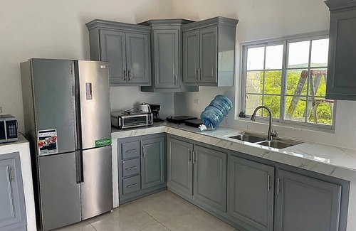 Spur Tree House | Beautiful Top Apartment in St. Elizabeth, Jamaica with an amazing Mountain View!