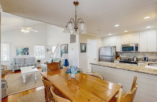 Pelican Bay House | Beautifully decorated cottage steps from the beach with pool & open layout