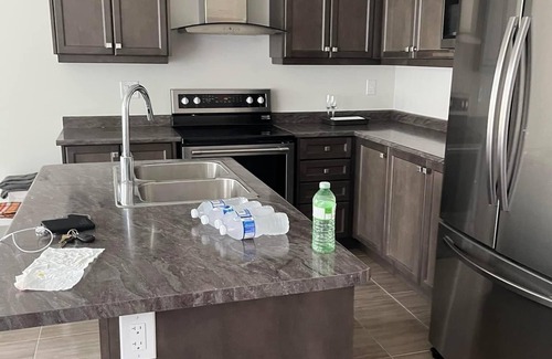 Thorold House | Bedroom Ensuite (Unit 1) @Welland, ON…a cozy bedroom space with jacuzzi