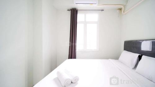 Surabaya Apartment | Best Choice and Cozy Living at 2BR at Bale Hinggil Apartment By Travelio