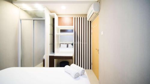 Surabaya Apartment | Best Choice and Cozy Living 2BR at Bale Hinggil Apartment By Travelio