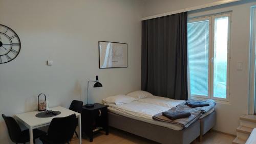 Jyvaskyla Apartment | Best location city center studio with balcony and free parking Kotimaailma apartments