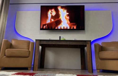 Wittenberge Apartment | Best-Preis -Gold Suite- mit Netflix, Self-Check-In, eBike Ladestation, Fahrradraum, WLAN, Netflix und Massagesessel - direkt am Elberadweg im Herzen von Wittenberge